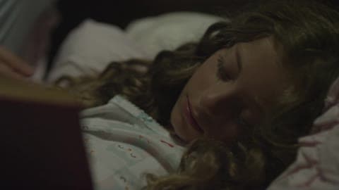 A Father Gets Up As His Daughter Sleeps