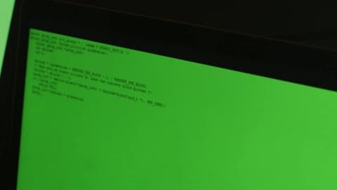 A Green Computer Monitor With Words Typed On It