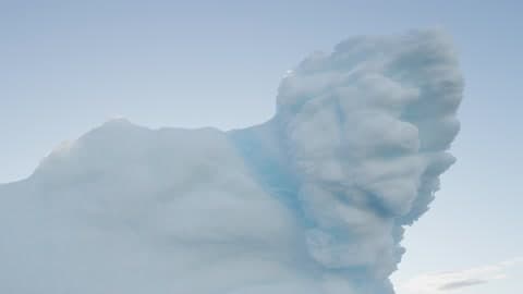 A Large Piece Of Ice With A Blue Line