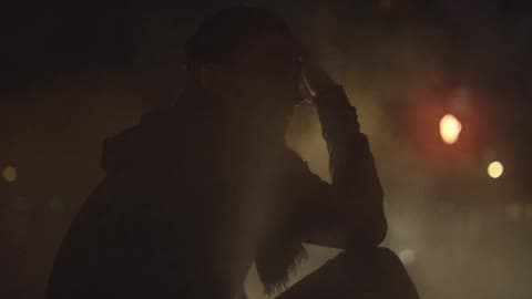 A Person Sitting In The Fog
