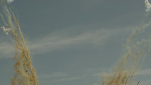 Colored Smoke Shoots Upward Into The Sky