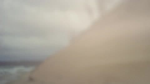 Sandy Hill Next To A Beach