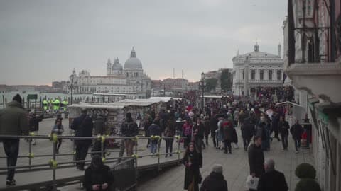 Shoppers Mingling At A City'S Open Market