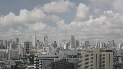 Timelapse Of A City With Clouds Moving On A Partly Cloudy Day