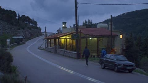 Two People Exit Car And Head Towards Building