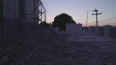 View Of The Outside Of A Building At Sunset